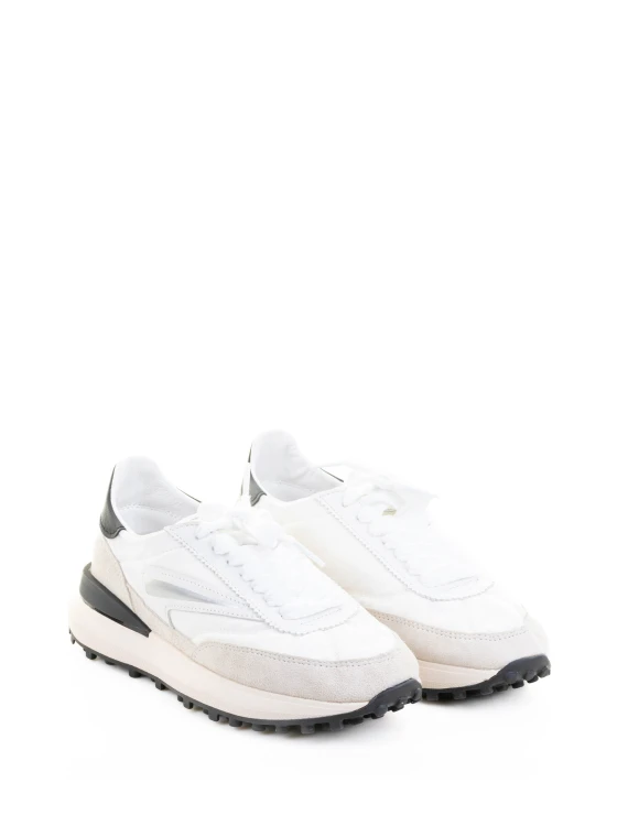 Black and white Athleta sneaker in nylon and suede
