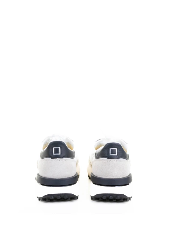Black and white Athleta sneaker in nylon and suede