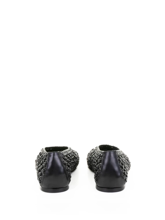 Perforated leather slipper