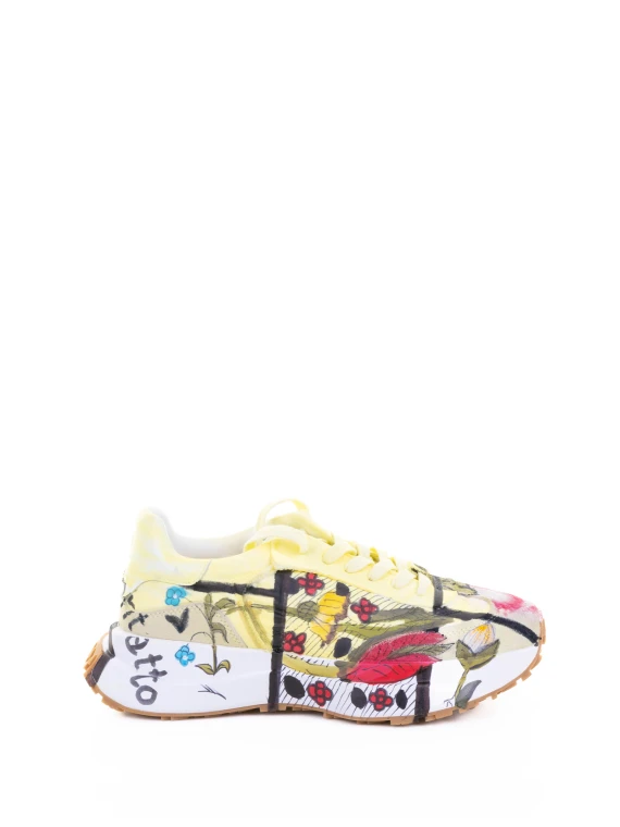 Sneaker gialla motivo floreale