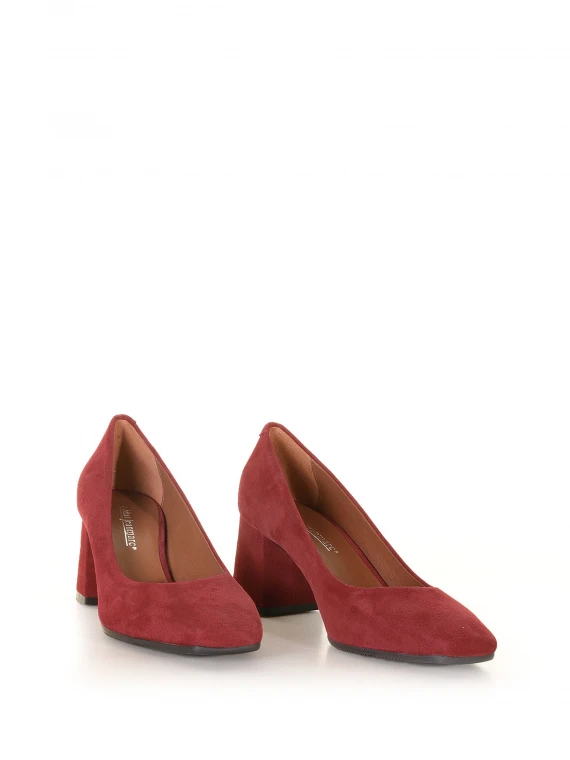 Red suede pumps