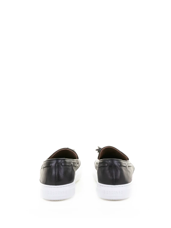 Black leather moccasin with tassels