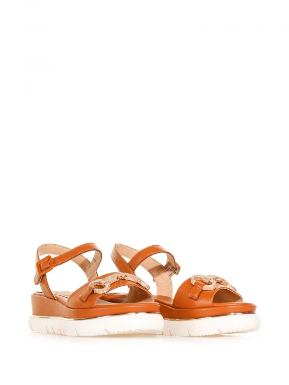 Orange sandal with hook accessory