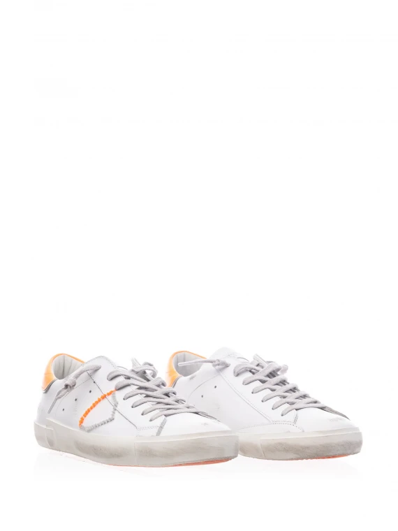 Sneakers PRSX in pelle e tallone arancio