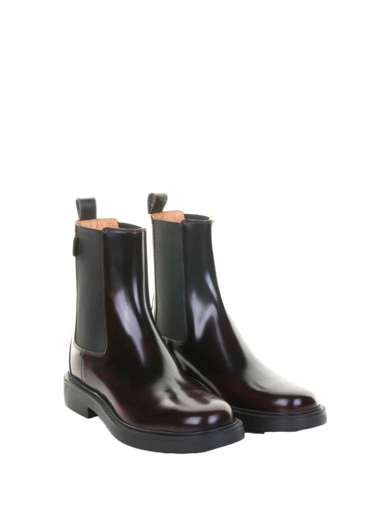 Beatles mosto in pelle lucida