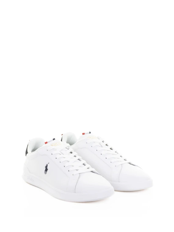 White leather sneaker with navy logo