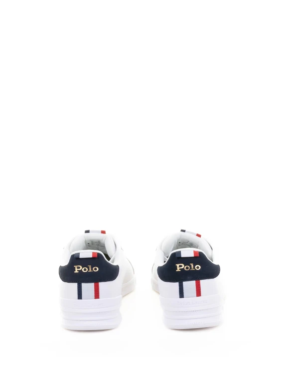 White leather sneaker with navy logo